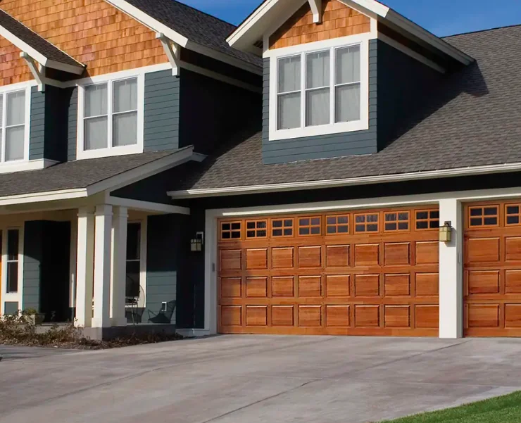 Clopay Classic Wood Collection traditional real wood garage door — Reynolds