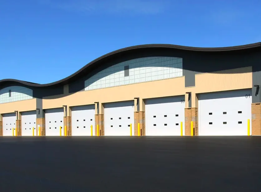 Polyurethane Intellicore insulated commercial sectional garage door — Reynolds